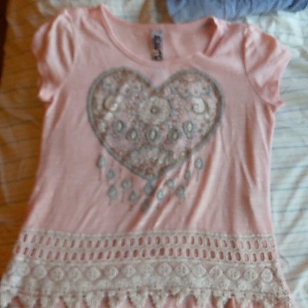 A pink frilly at the bottom flower beads shirt for 14 year old girls 👧💕